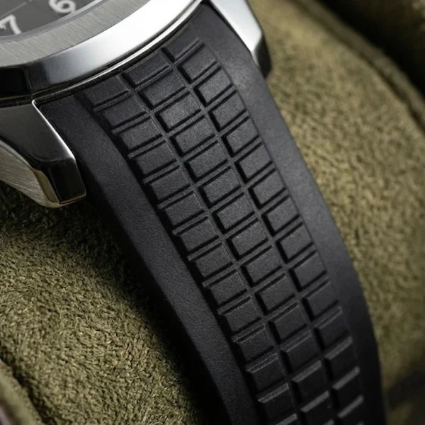 VEY 013 textured rubber sport strap detail — grid-pattern black rubber band