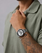 VEY 004 — side profile, slim chronograph